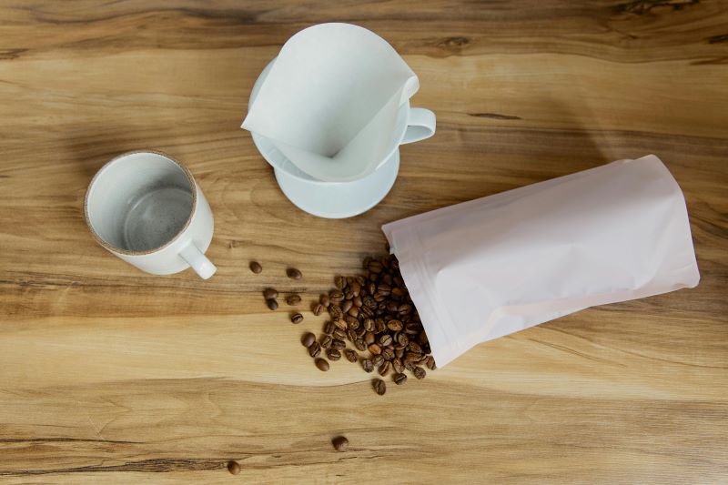 Coffee packaging, pour over, and cup.